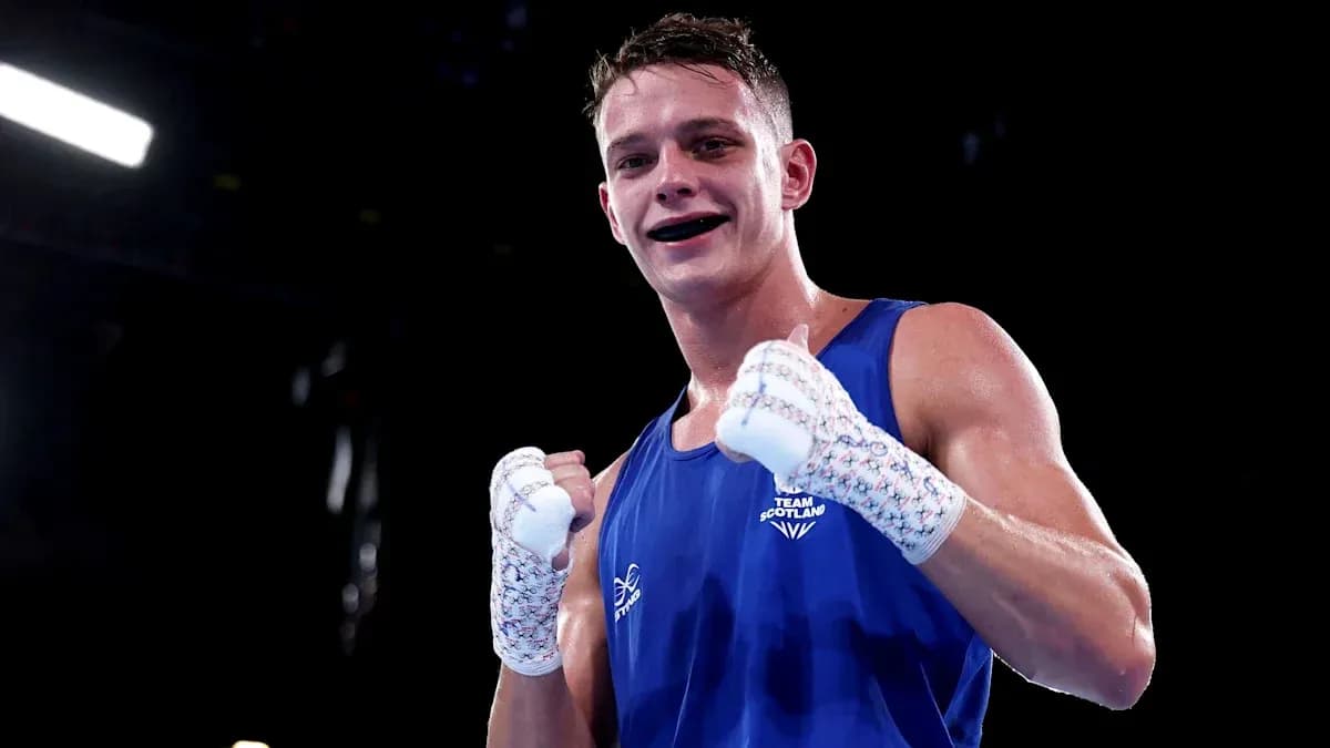 Boxer celebrating victory in blue uniform Boxer celebrating victory in blue uniform