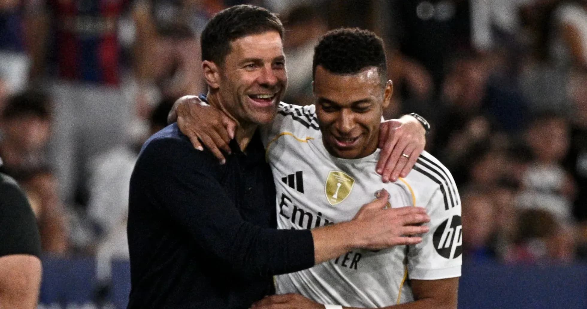 Coach and player celebrating together after match Coach and player celebrating together after match