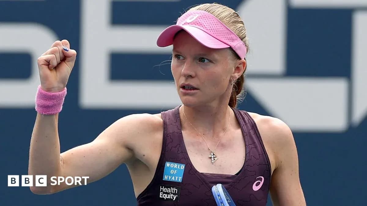 Tennis player celebrating with raised fist during match Tennis player celebrating with raised fist during match