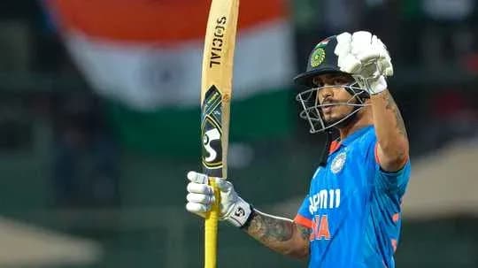 Batsman celebrating with bat during cricket match Batsman celebrating with bat during cricket match
