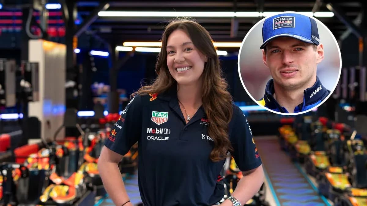 Team member in Red Bull Racing garage smiling Team member in Red Bull Racing garage smiling