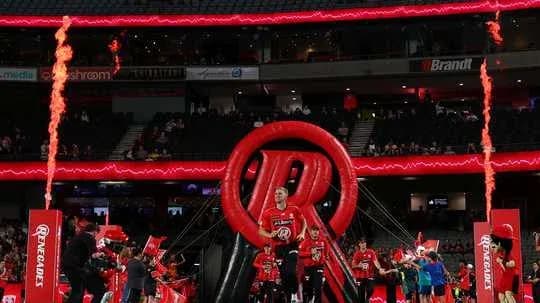 Players entering arena through inflatable entrance Players entering arena through inflatable entrance