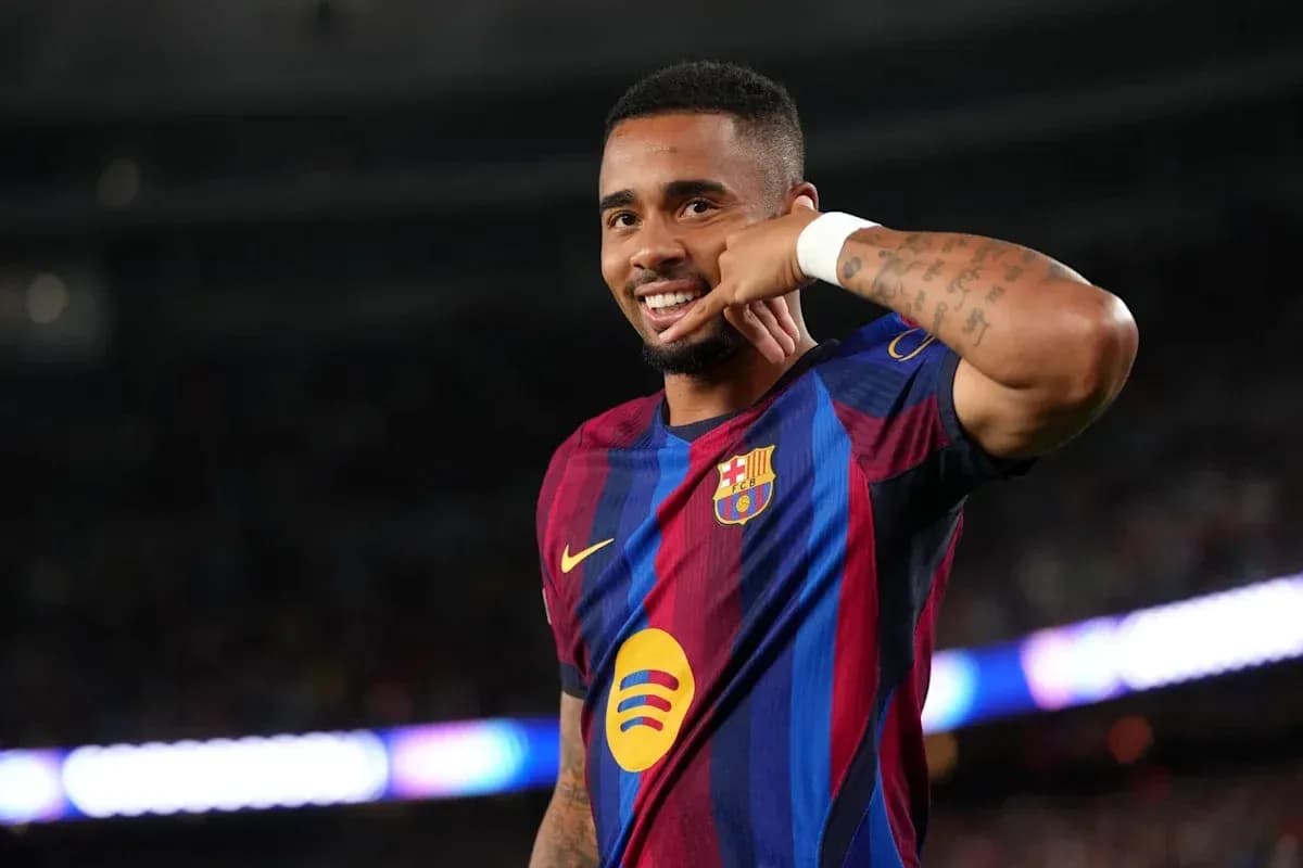 Player celebrating a goal with a phone gesture Player celebrating a goal with a phone gesture