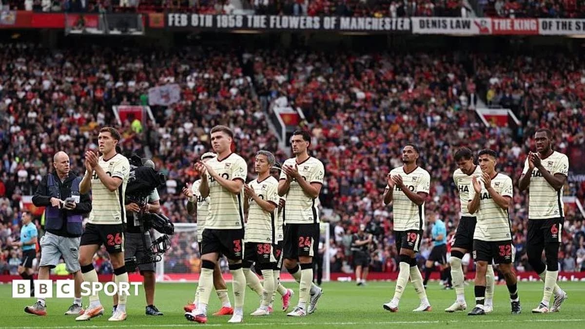 Players applauding fans after a match at Old Trafford Players applauding fans after a match at Old Trafford