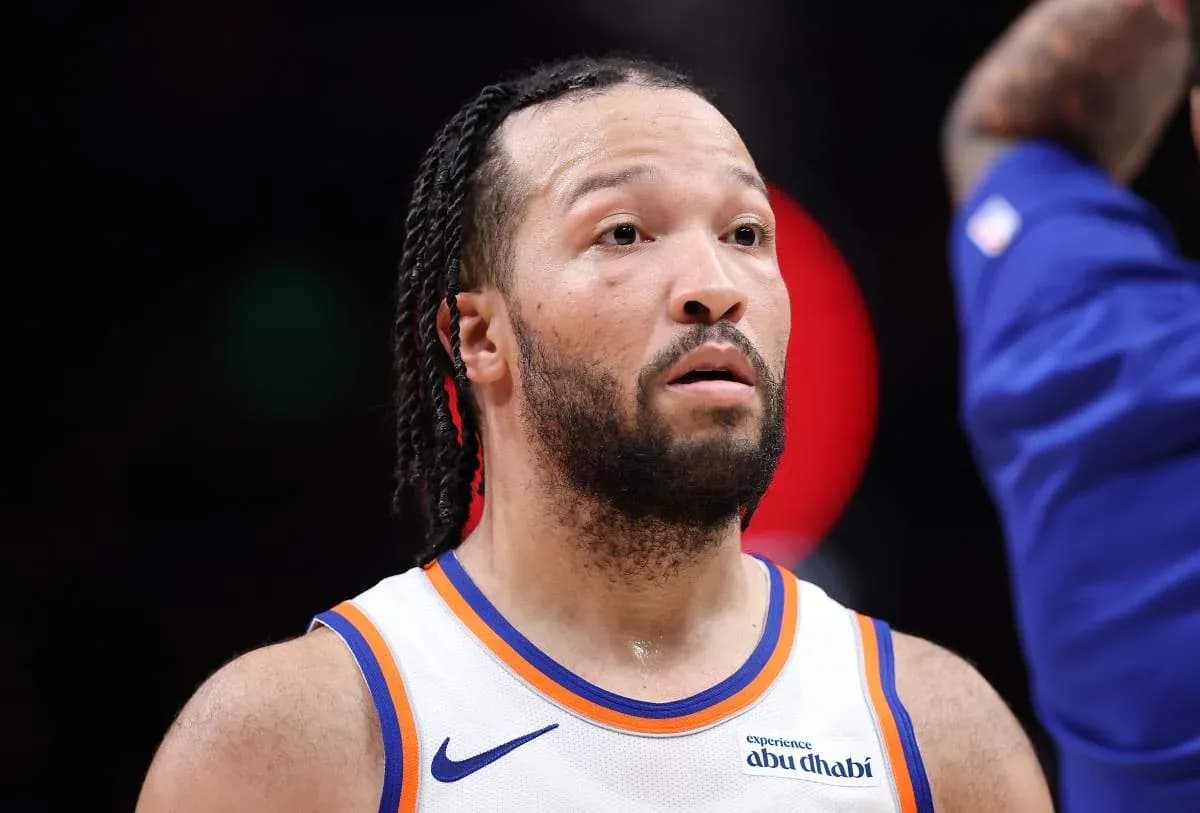 Basketball player in team jersey during game Basketball player in team jersey during game