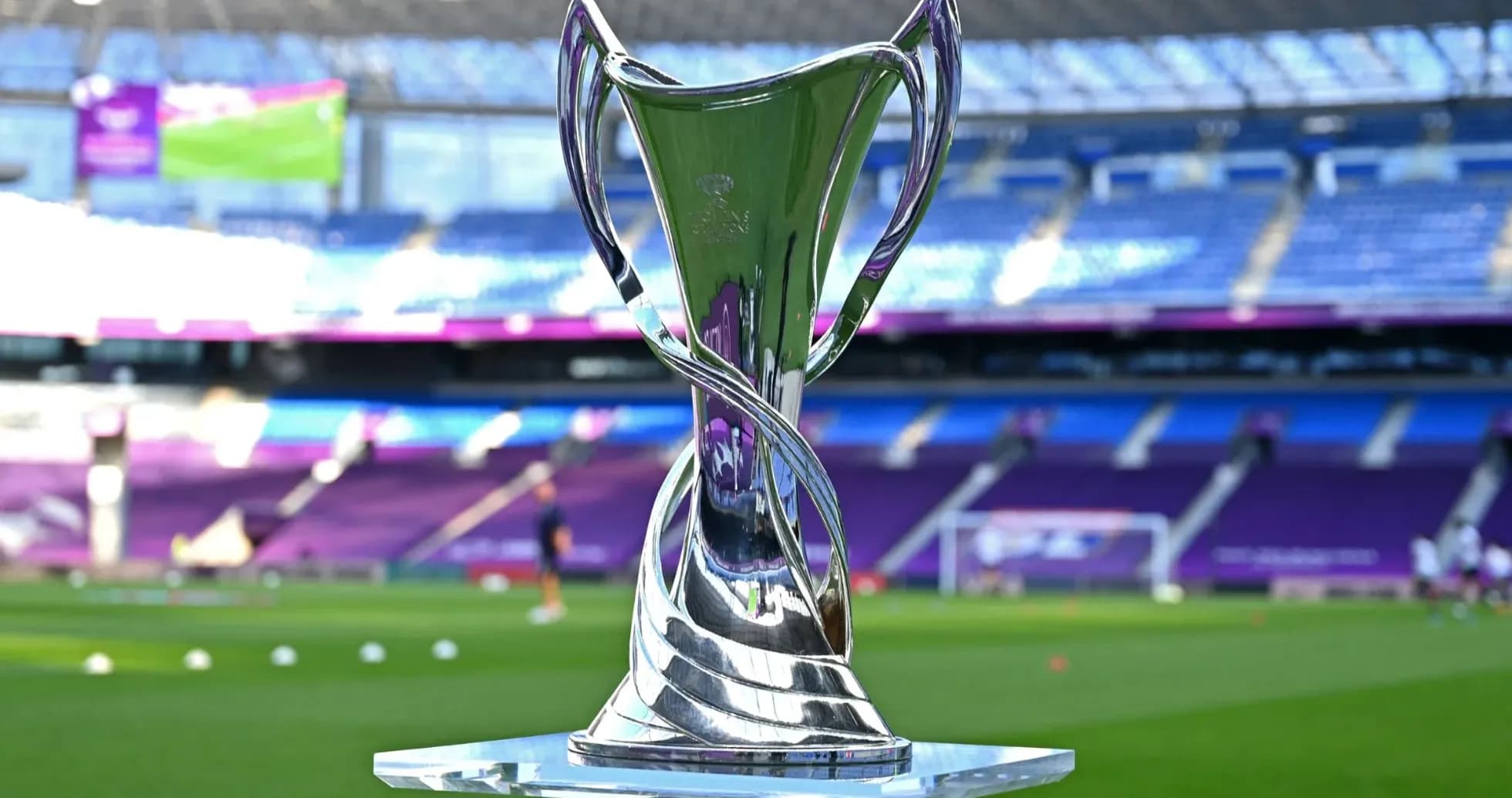 Close-up of trophy on pitch before match Close-up of trophy on pitch before match