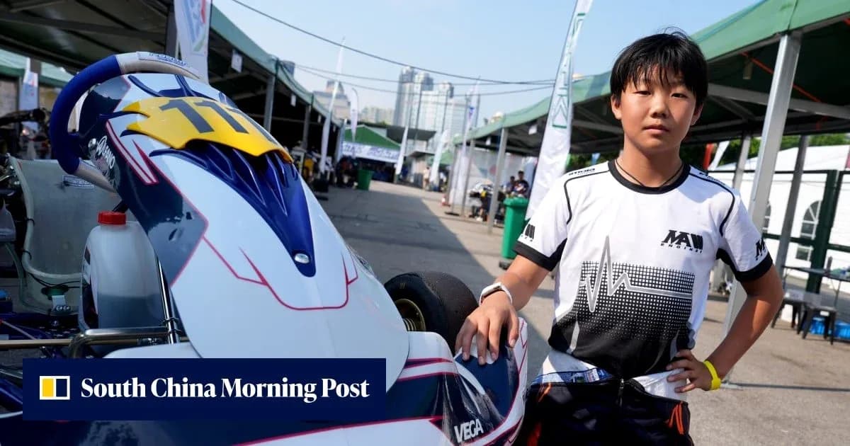 Young driver standing next to a go-kart Young driver standing next to a go-kart