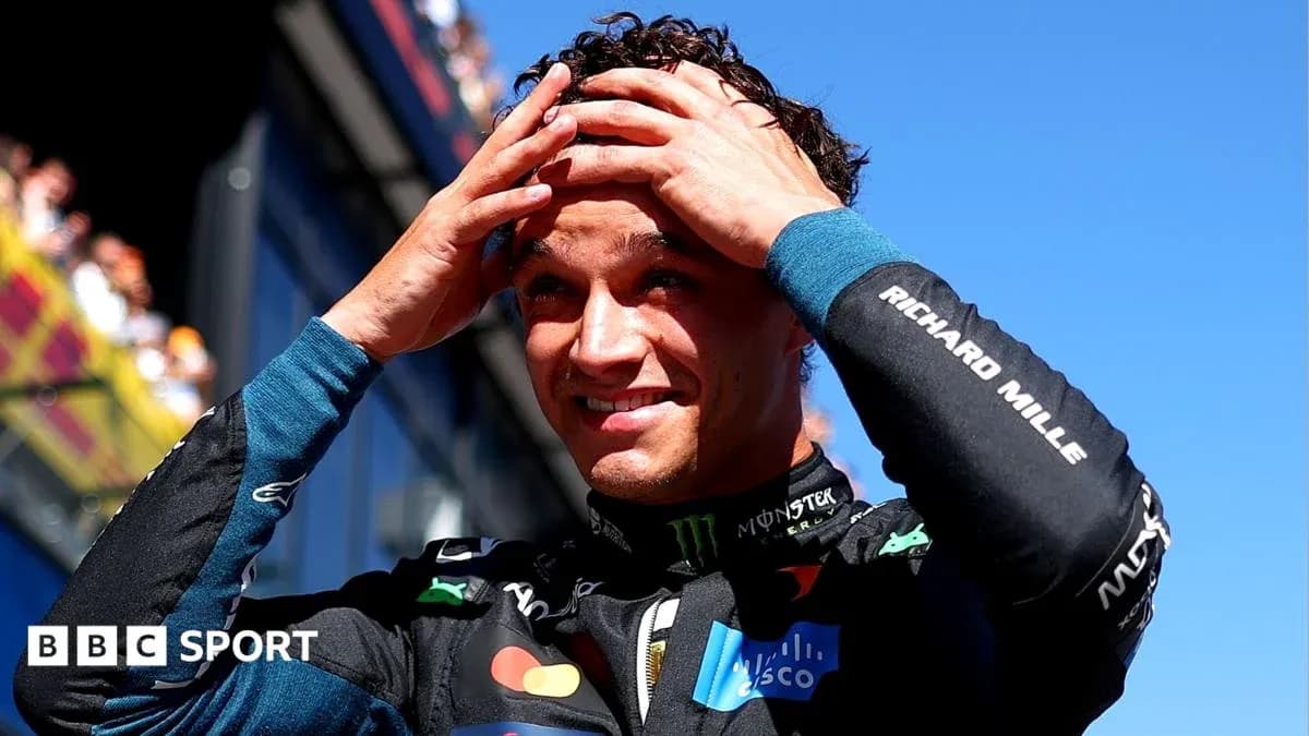 Driver celebrating after a race with hands on head Driver celebrating after a race with hands on head