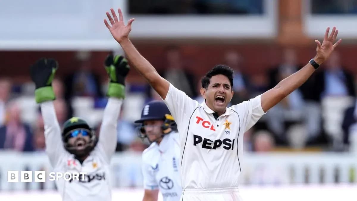 Bowler celebrating a wicket with teammates during match Bowler celebrating a wicket with teammates during match