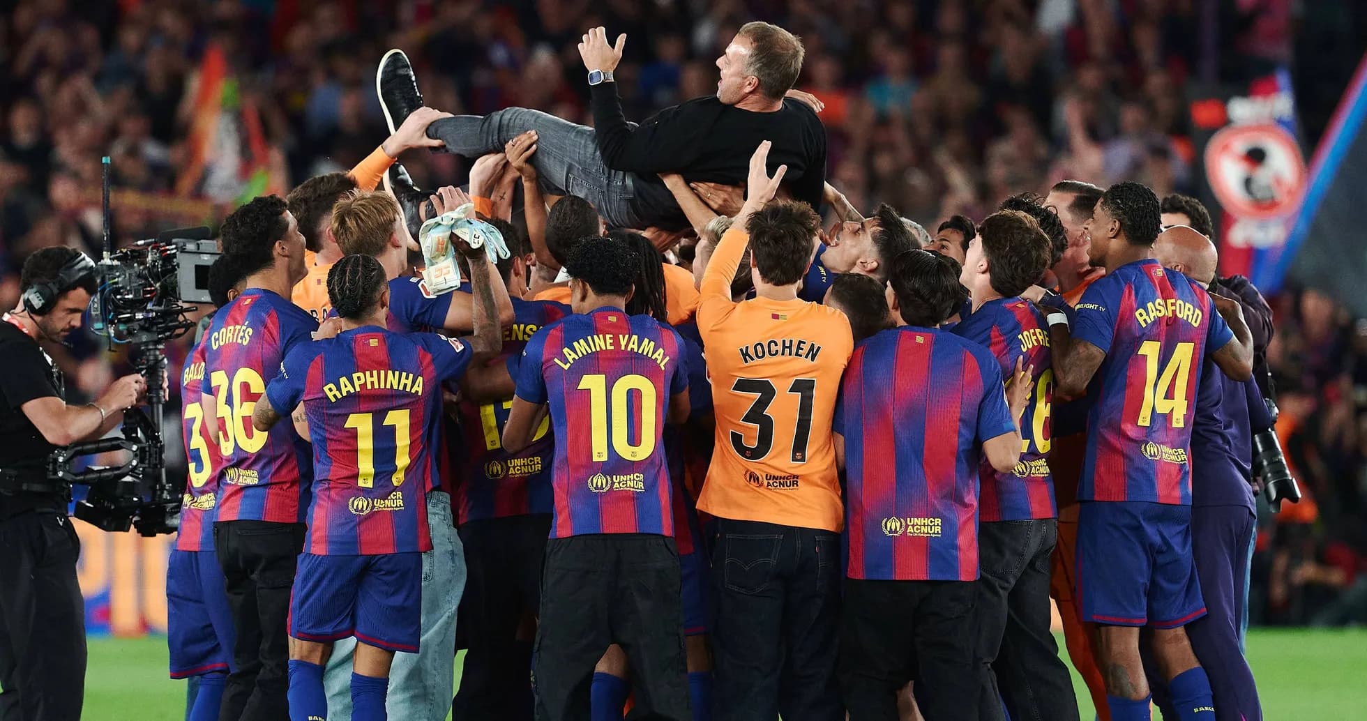Barcelona players celebrating with coach after victory Barcelona players celebrating with coach after victory