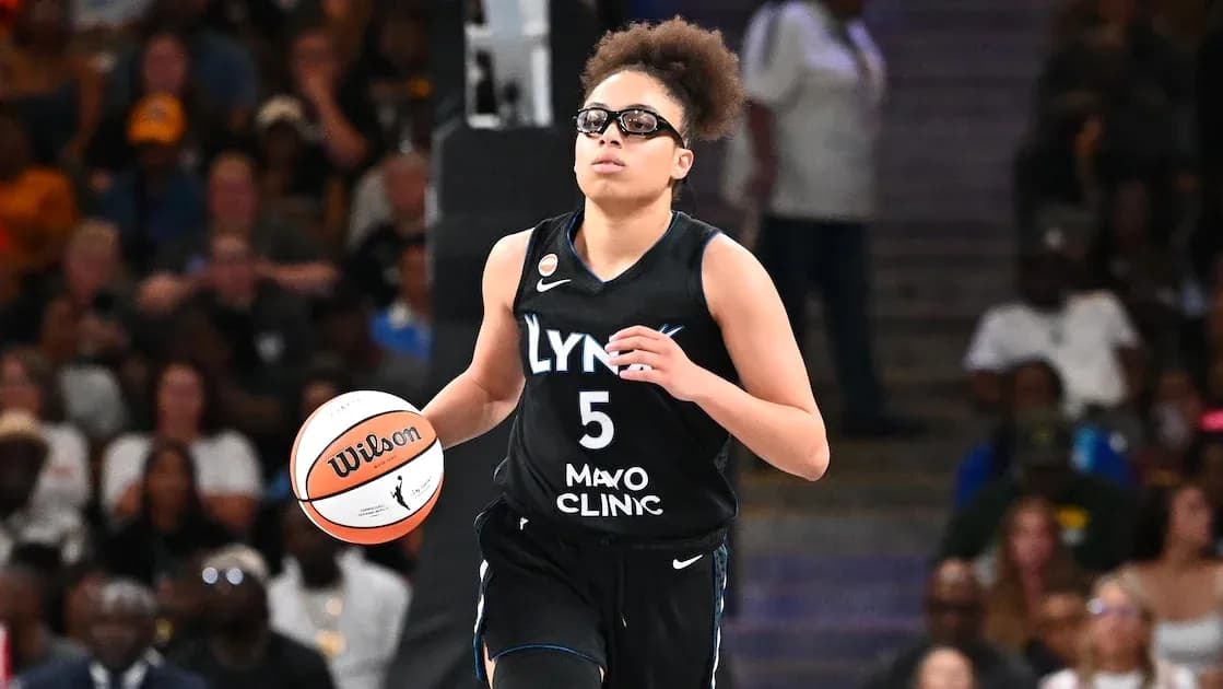 Player dribbling the ball during a basketball game Player dribbling the ball during a basketball game