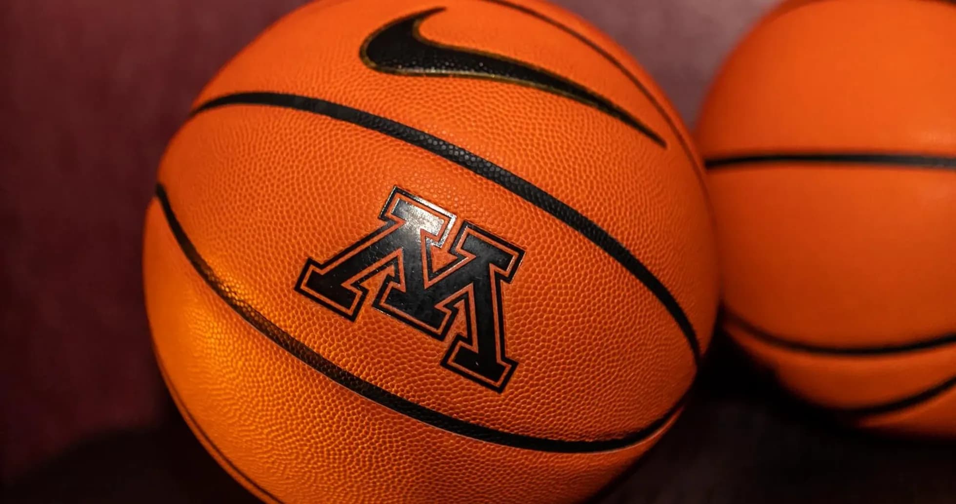 Two basketballs with Minnesota logo and Nike branding Two basketballs with Minnesota logo and Nike branding