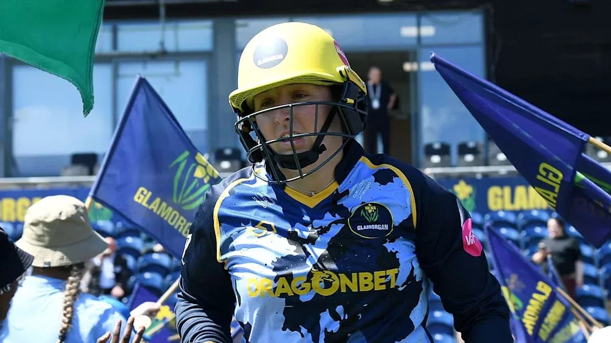 Player wearing helmet and Glamorgan kit entering the field Player wearing helmet and Glamorgan kit entering the field