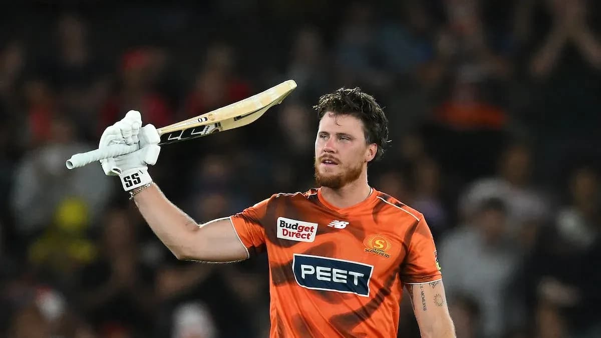 Batsman celebrating after scoring a century Batsman celebrating after scoring a century