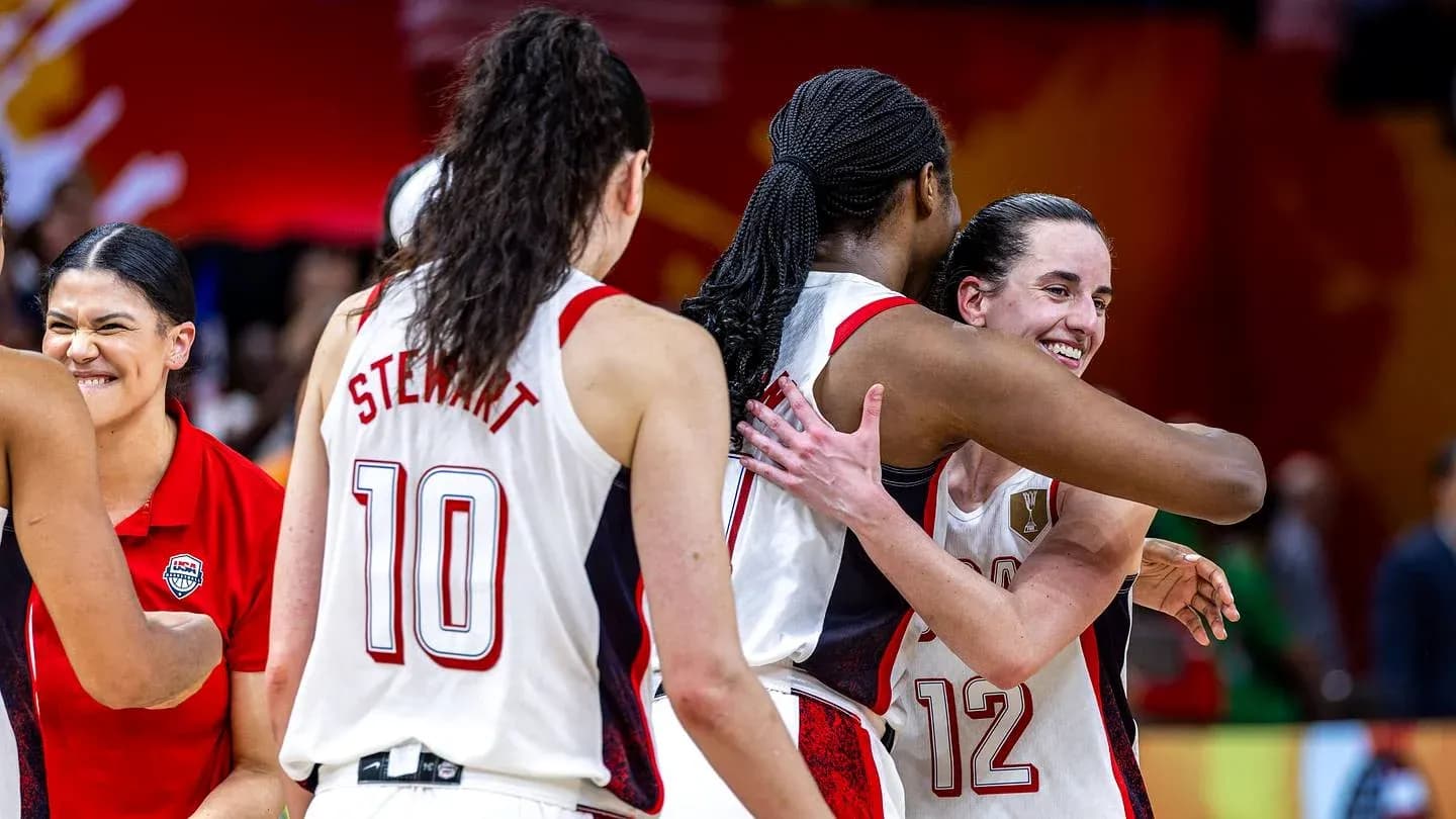 Players celebrating and hugging after a game Players celebrating and hugging after a game
