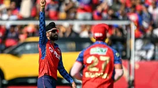 Bowler celebrating a wicket during cricket match Bowler celebrating a wicket during cricket match
