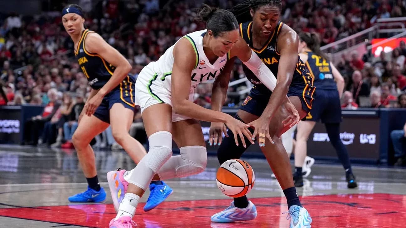 Players battling for possession of the basketball Players battling for possession of the basketball