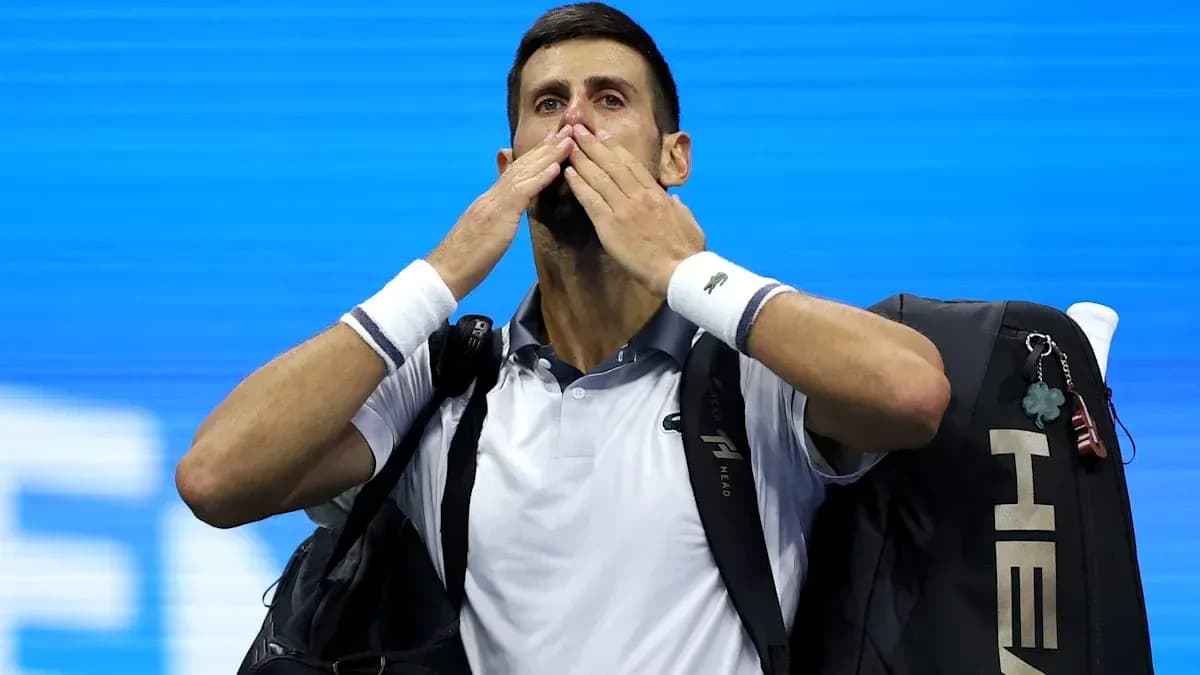 Tennis player blowing kisses to crowd after match Tennis player blowing kisses to crowd after match