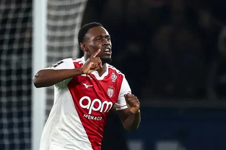 Monaco player celebrating after scoring a goal Monaco player celebrating after scoring a goal