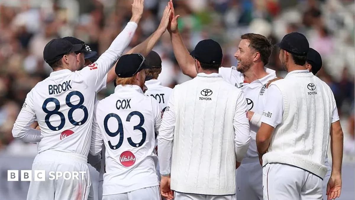 Cricket team celebrating a wicket on the field Cricket team celebrating a wicket on the field