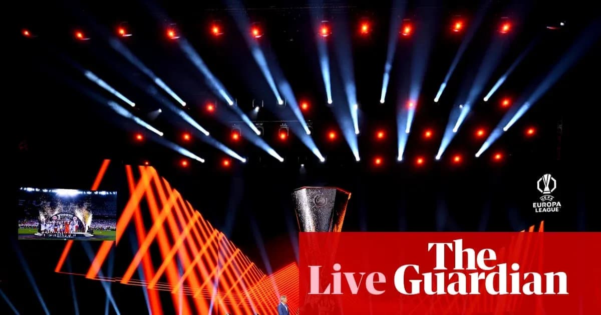 Europa League trophy displayed with stage lights Europa League trophy displayed with stage lights