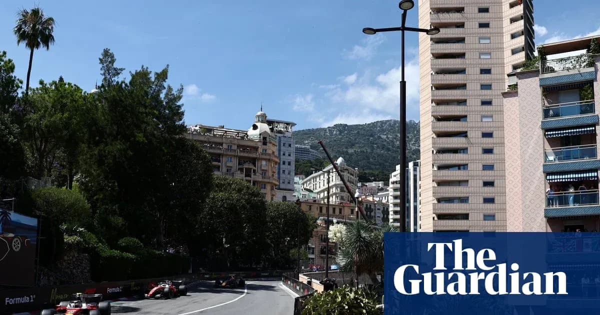 Formula 1 cars racing through Monaco street circuit Formula 1 cars racing through Monaco street circuit