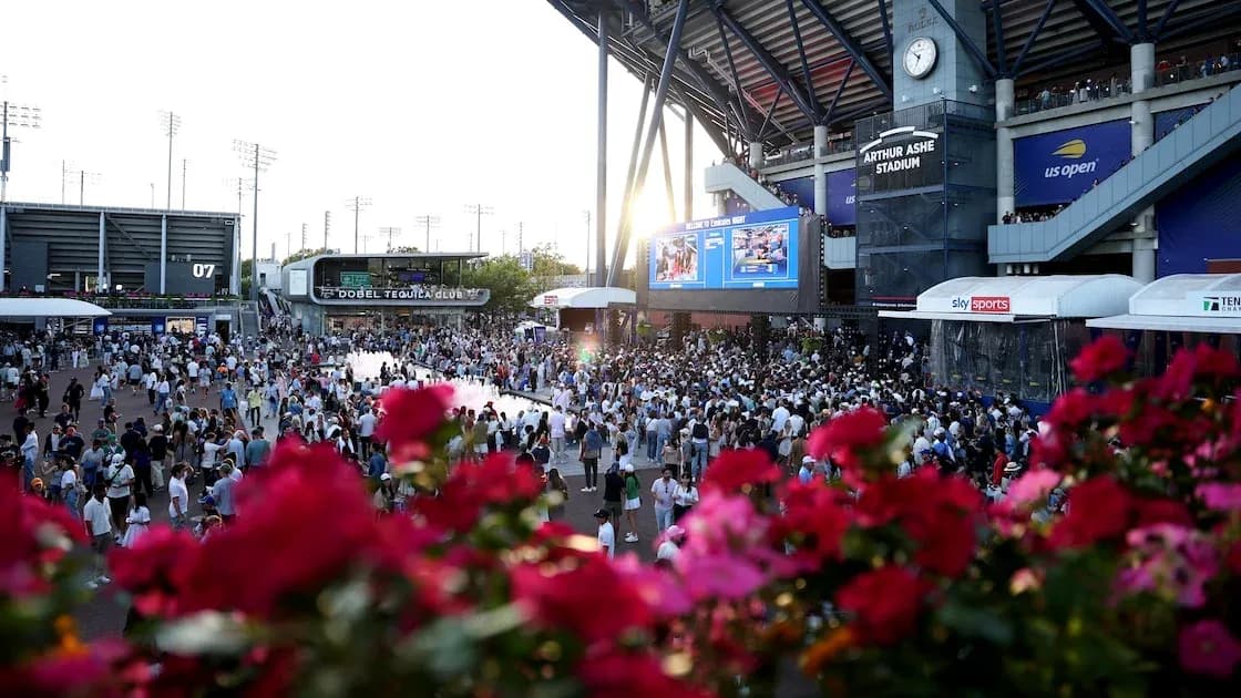 Crowd gathered outside Arthur Ashe Stadium at sunset Crowd gathered outside Arthur Ashe Stadium at sunset
