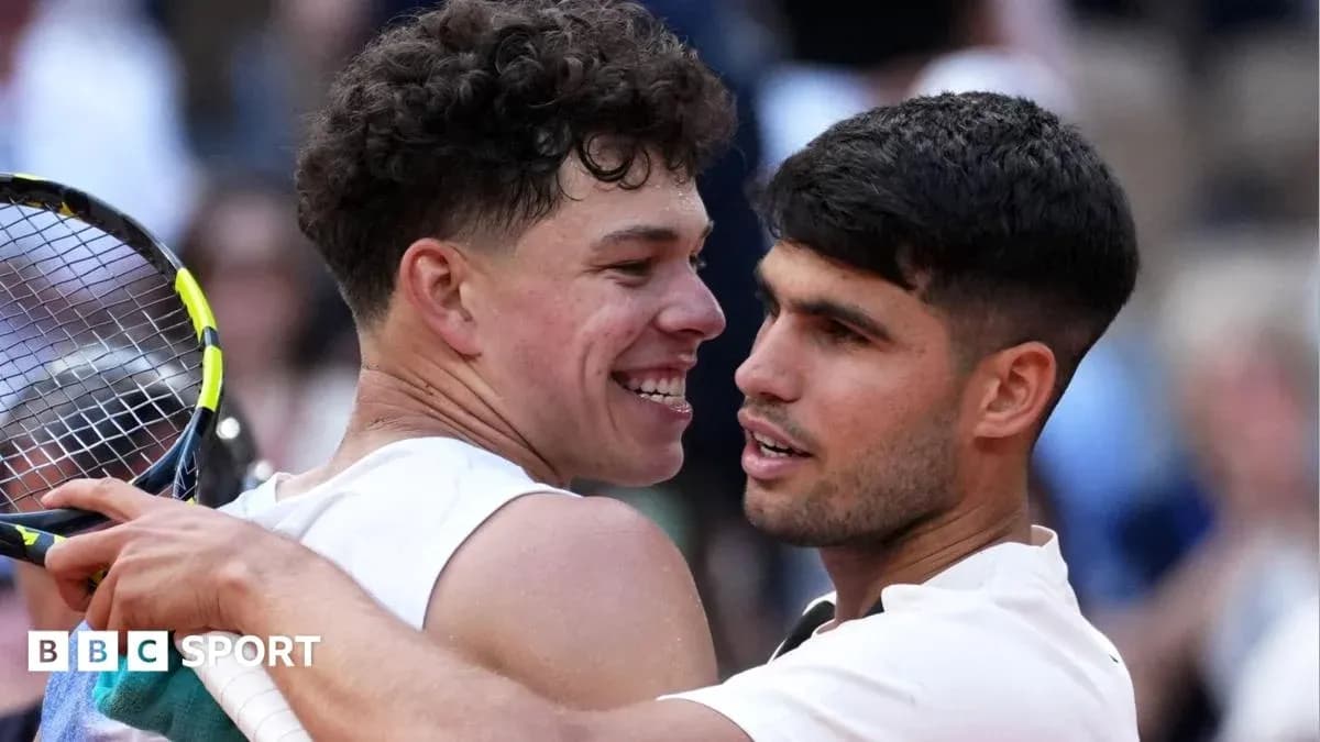 Two tennis players embracing after a match Two tennis players embracing after a match