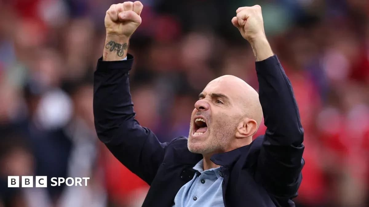 Coach celebrating with raised fists during match Coach celebrating with raised fists during match