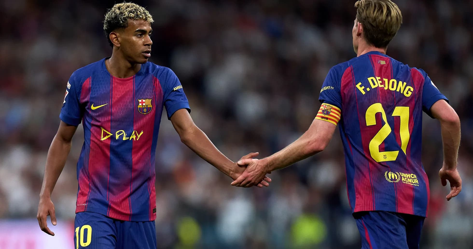 Barcelona players shaking hands during match Barcelona players shaking hands during match
