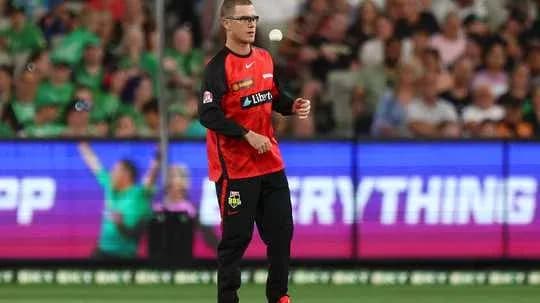 Player preparing to bowl in cricket match Player preparing to bowl in cricket match