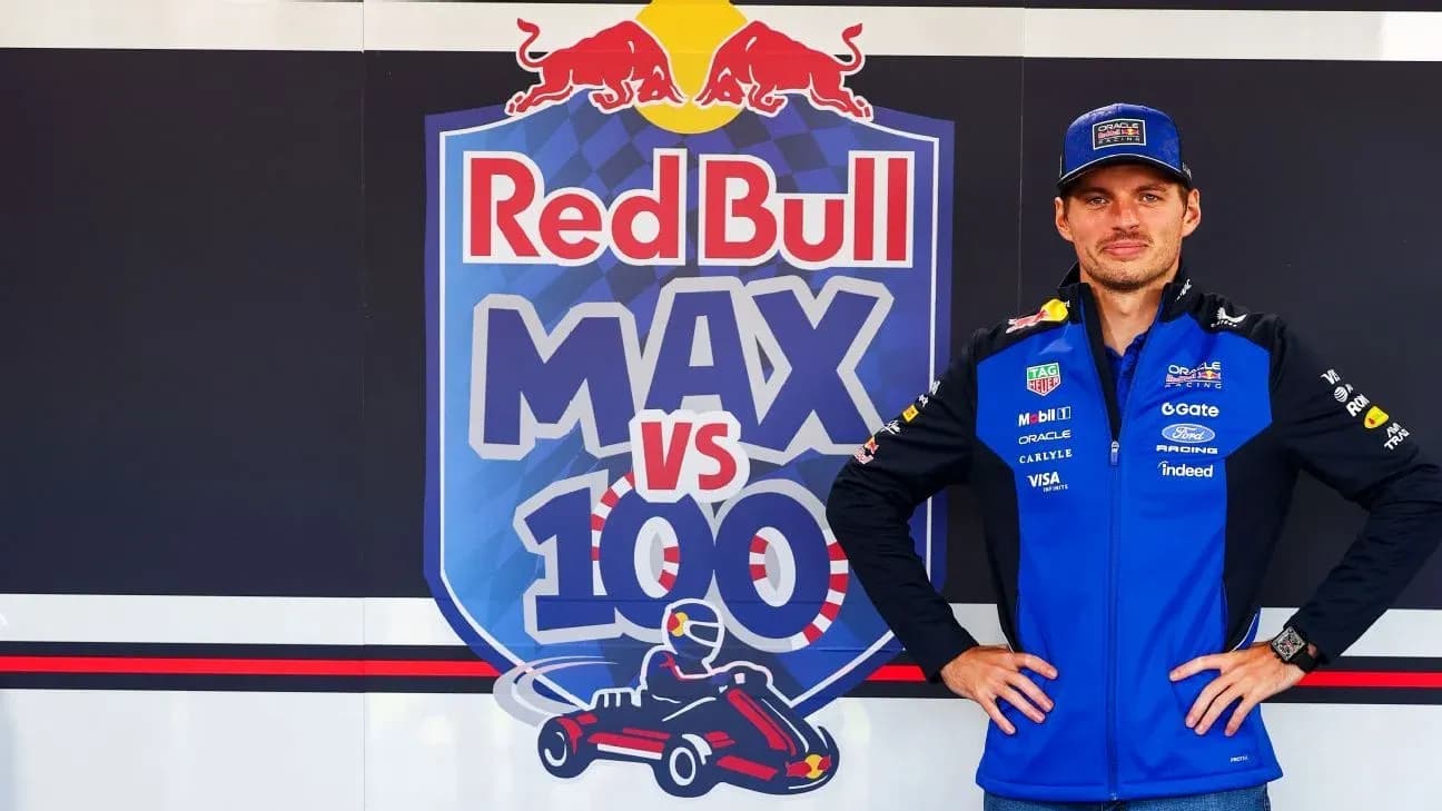 Driver posing in front of Red Bull event backdrop Driver posing in front of Red Bull event backdrop