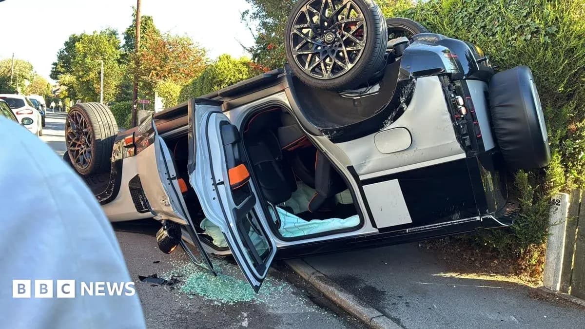 Upside-down sports car on the roadside Upside-down sports car on the roadside
