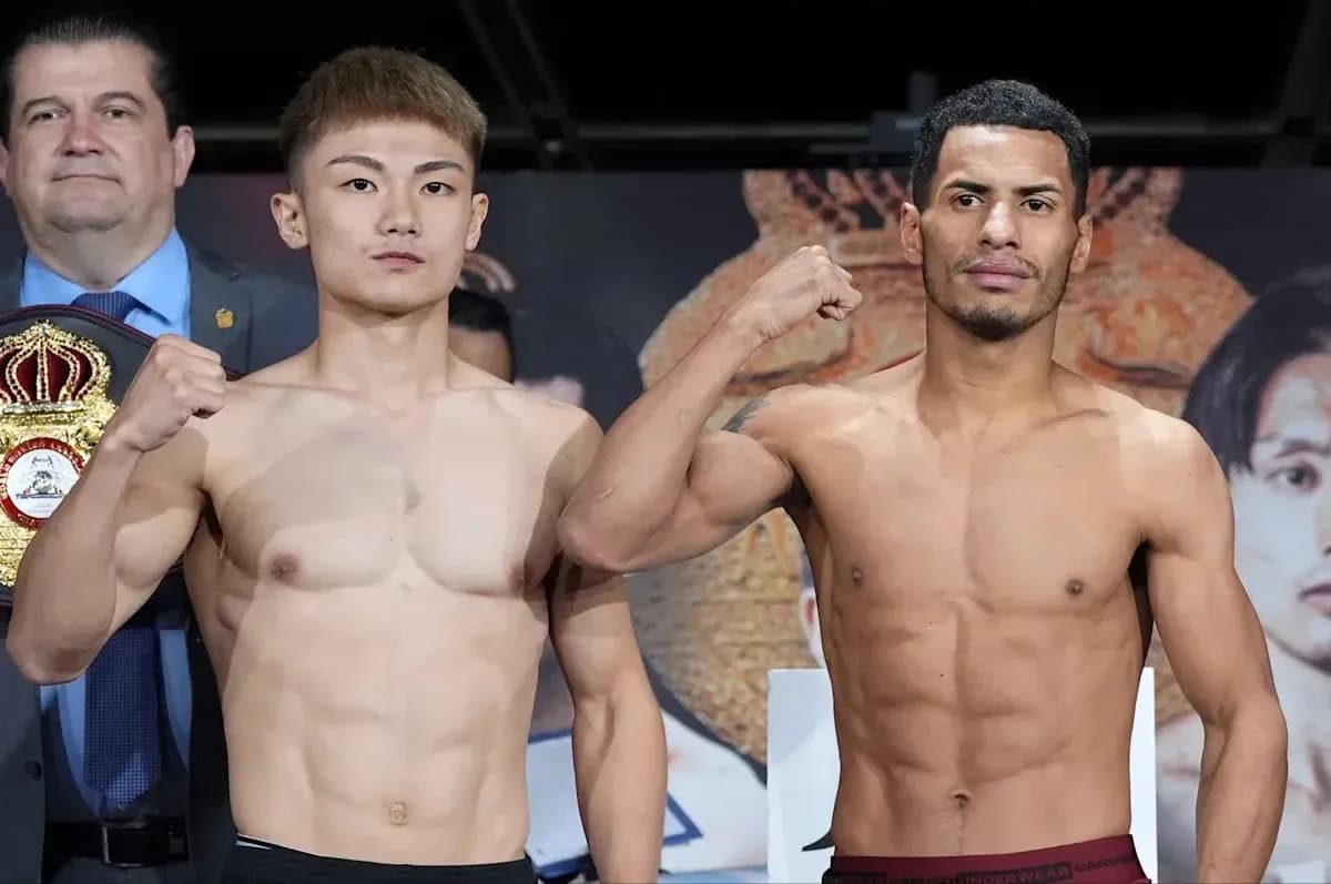 Two boxers posing for weigh-in before match Two boxers posing for weigh-in before match