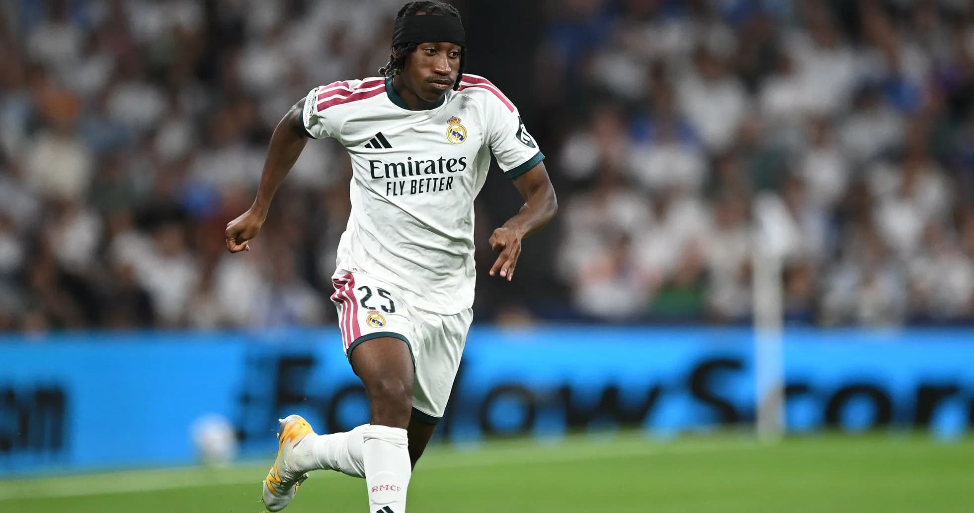 Player running with the ball during a match Player running with the ball during a match