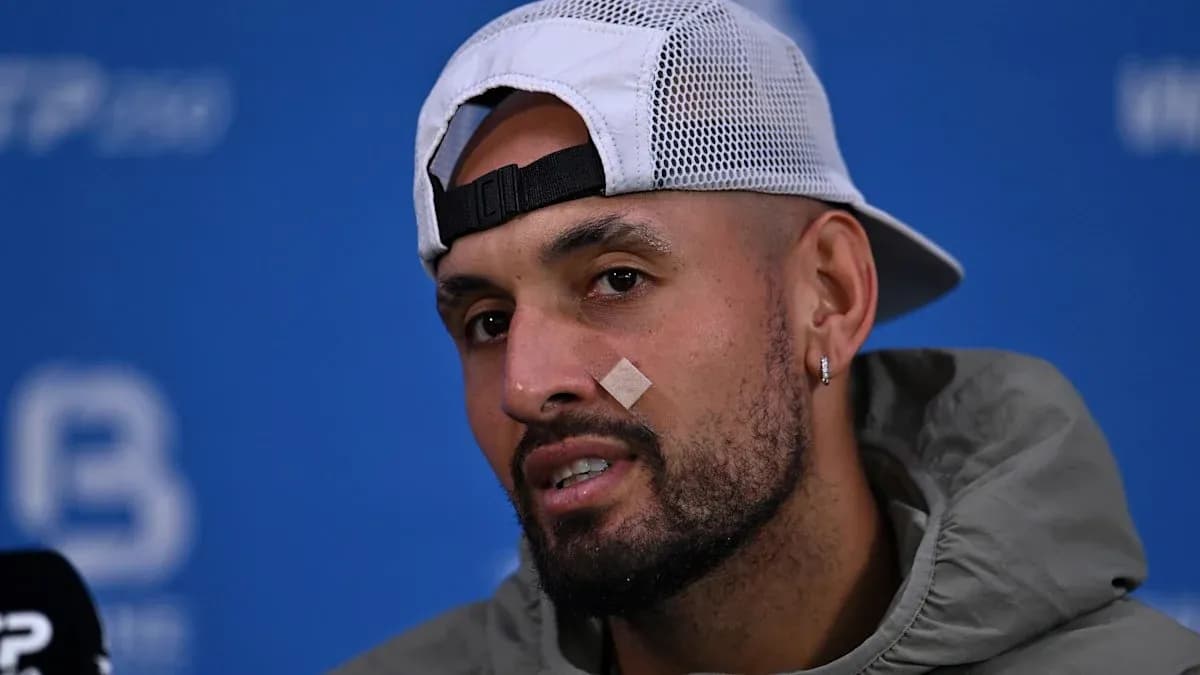 Player speaking at press conference with bandage on face Player speaking at press conference with bandage on face