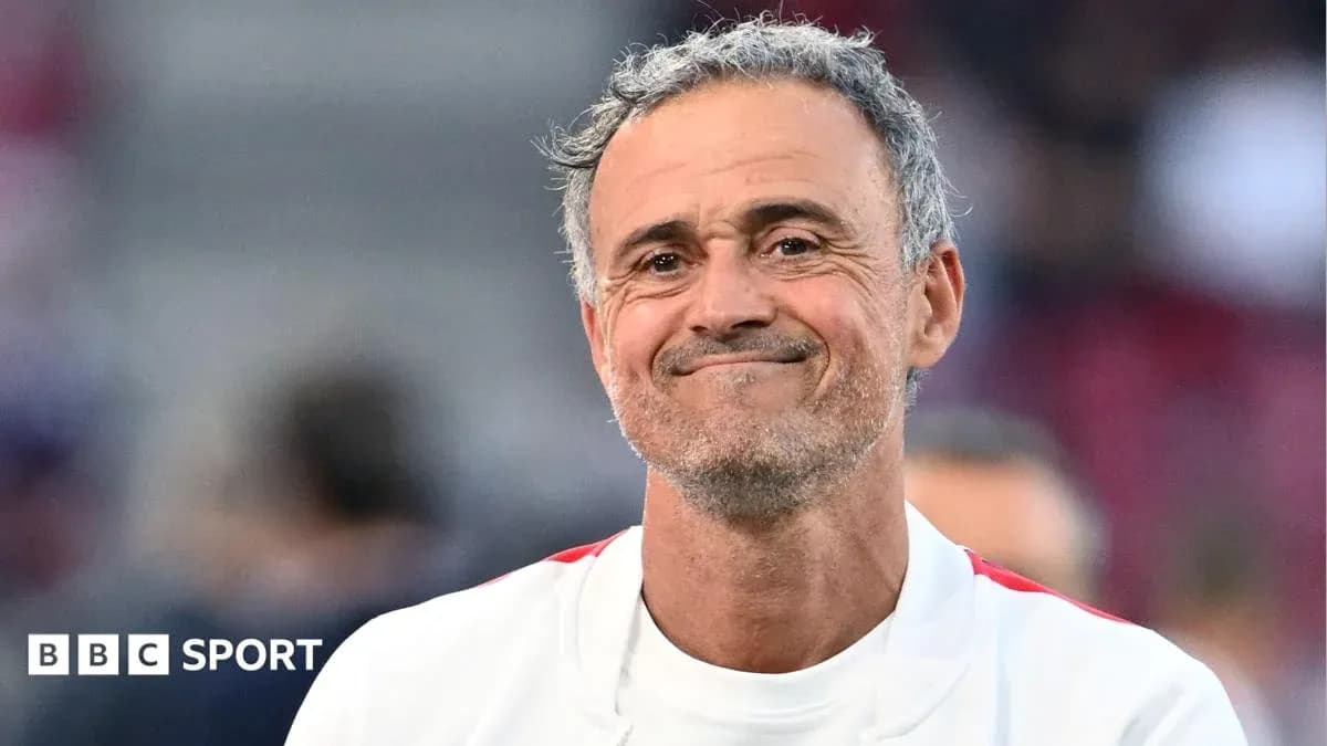 Coach smiling on the sidelines during match Coach smiling on the sidelines during match