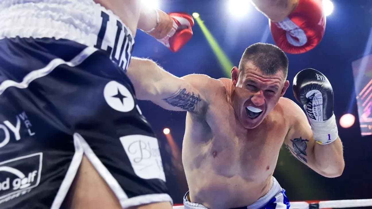 Boxer dodging a punch in the ring Boxer dodging a punch in the ring