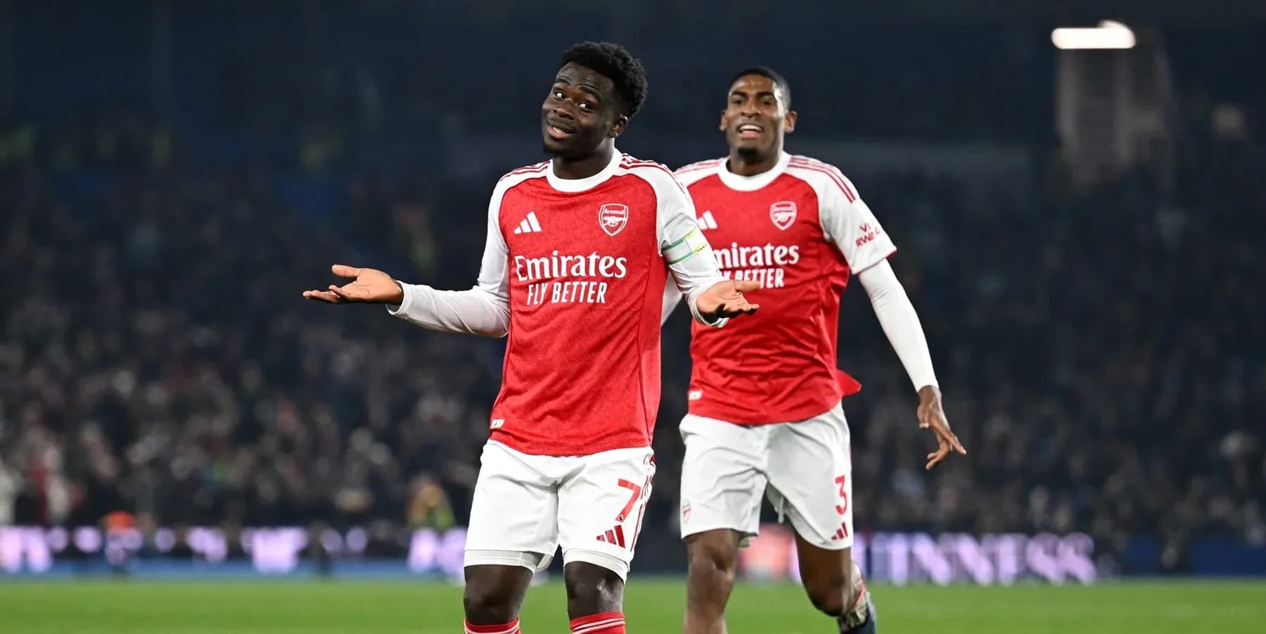 Arsenal players celebrating during match against Brighton Arsenal players celebrating during match against Brighton