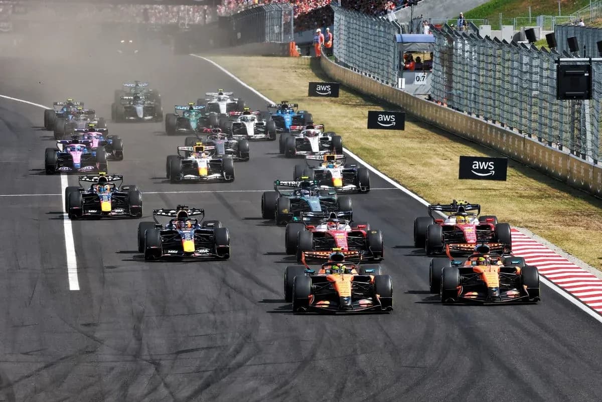 Formula 1 cars racing on track during event Formula 1 cars racing on track during event