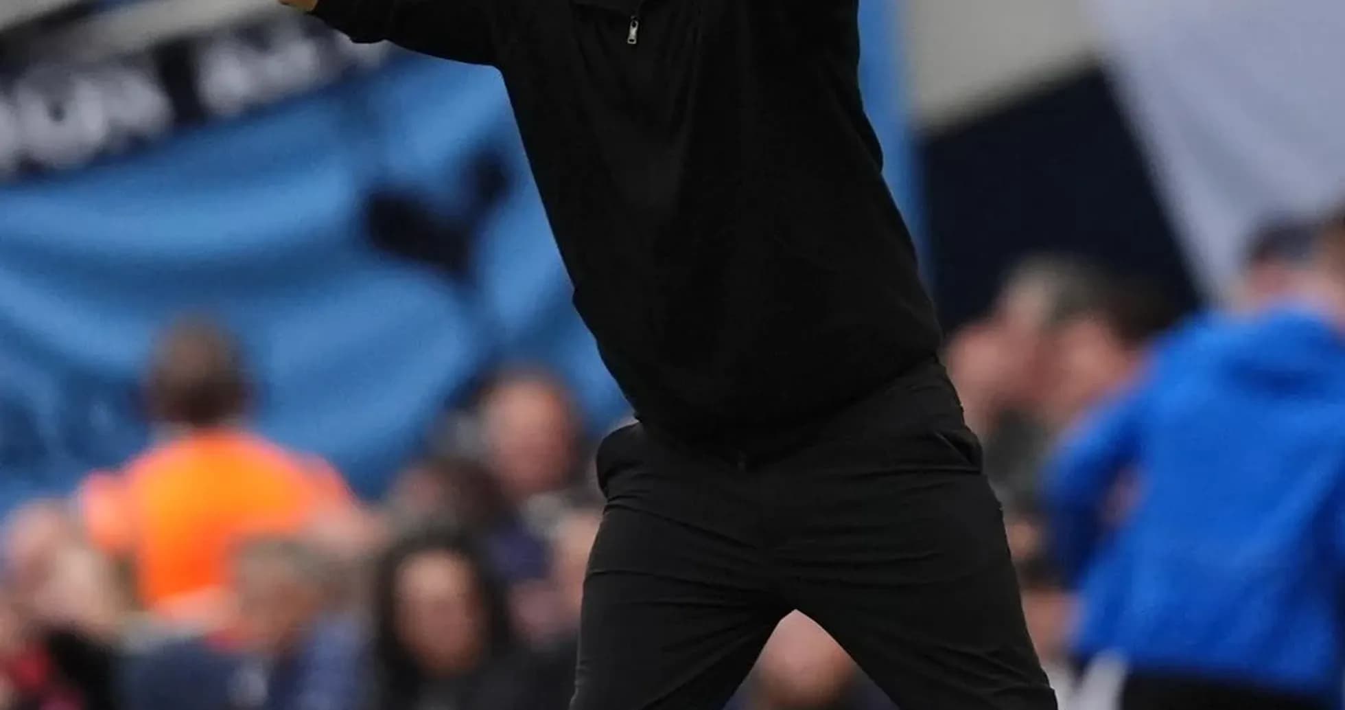 Coach gesturing passionately on the sideline Coach gesturing passionately on the sideline