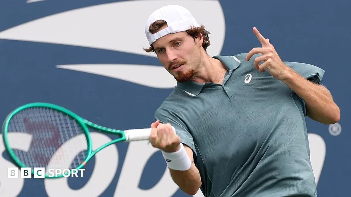 Player hitting a forehand during tennis match Player hitting a forehand during tennis match