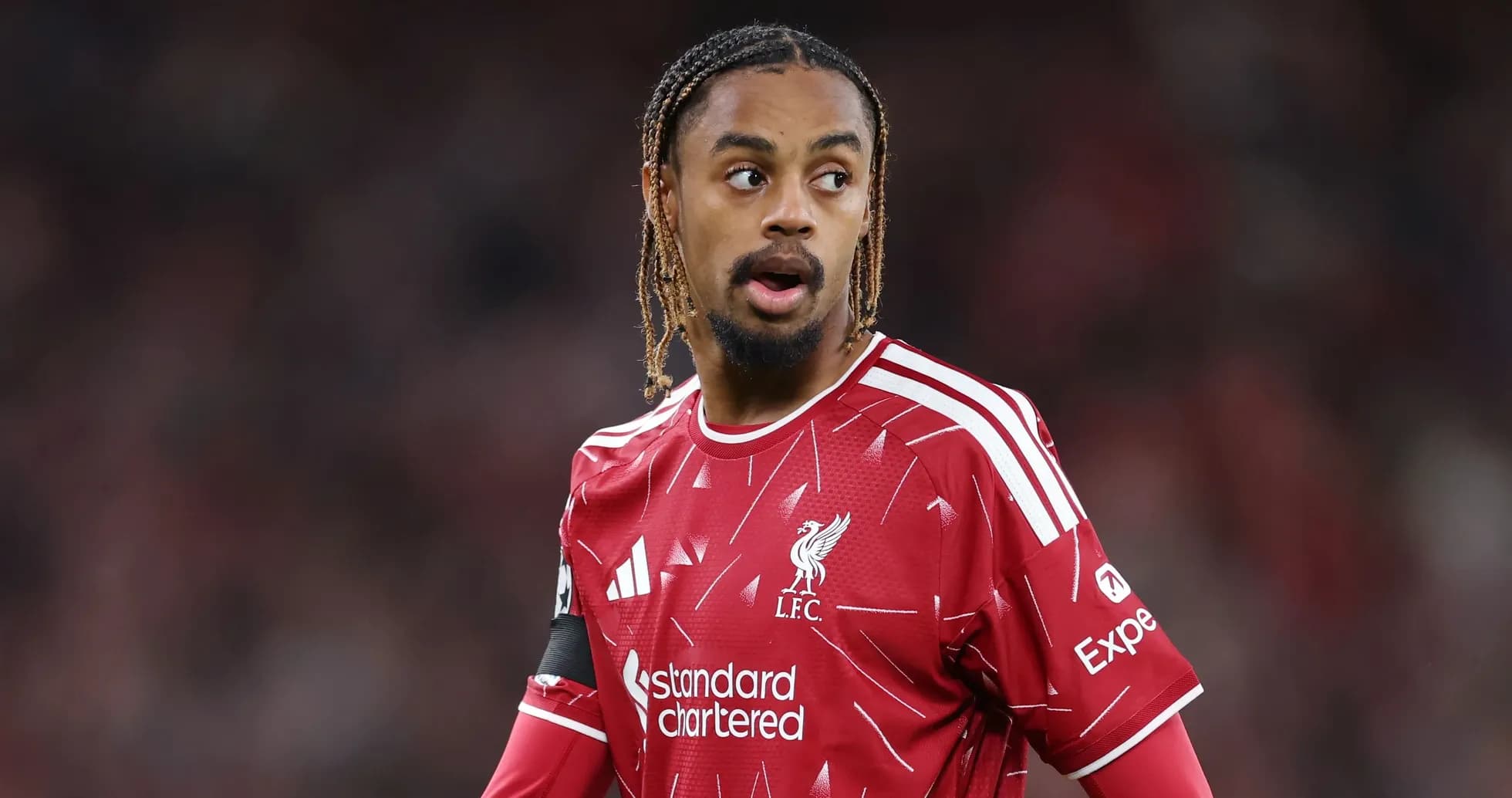 Liverpool player in red kit during match Liverpool player in red kit during match