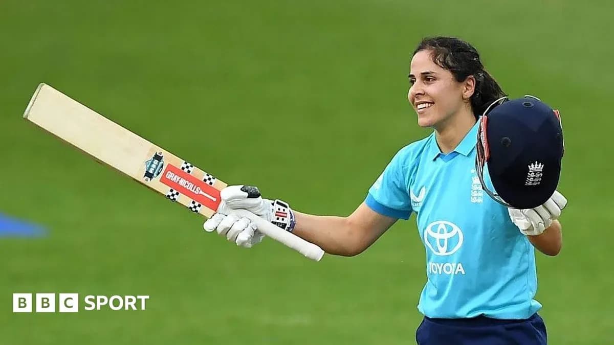 Batter celebrating with bat and helmet after scoring Batter celebrating with bat and helmet after scoring