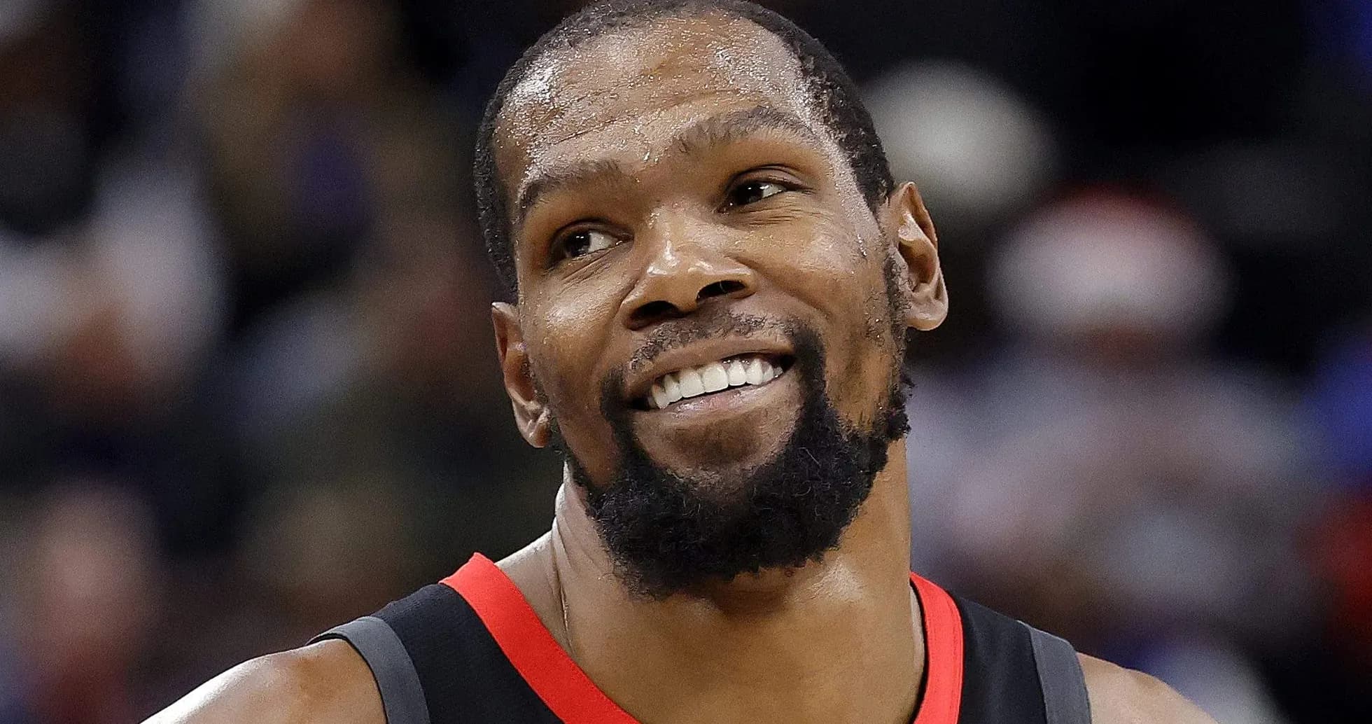Kevin Durant smiling during basketball game Kevin Durant smiling during basketball game