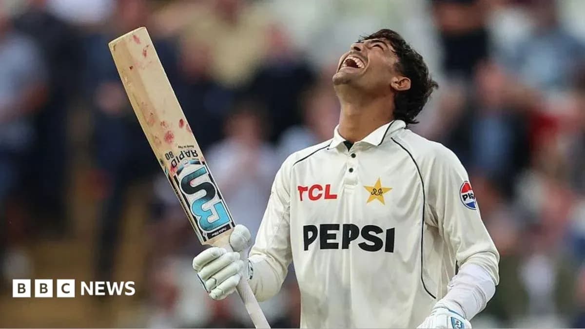 Cricketer celebrating with bat raised in joy Cricketer celebrating with bat raised in joy