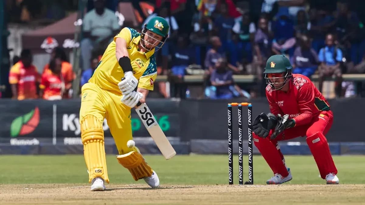 Batsman playing a shot against the wicketkeeper Batsman playing a shot against the wicketkeeper