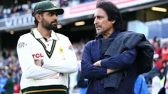 Cricketer and official discussing on the field Cricketer and official discussing on the field