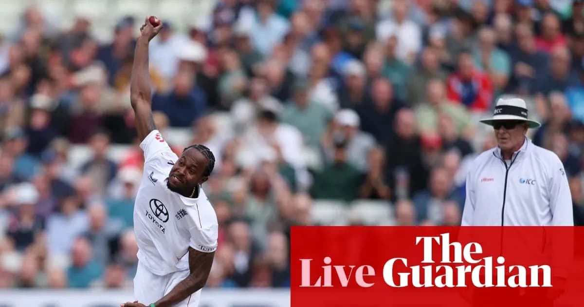Bowler delivering a ball with spectators in background Bowler delivering a ball with spectators in background