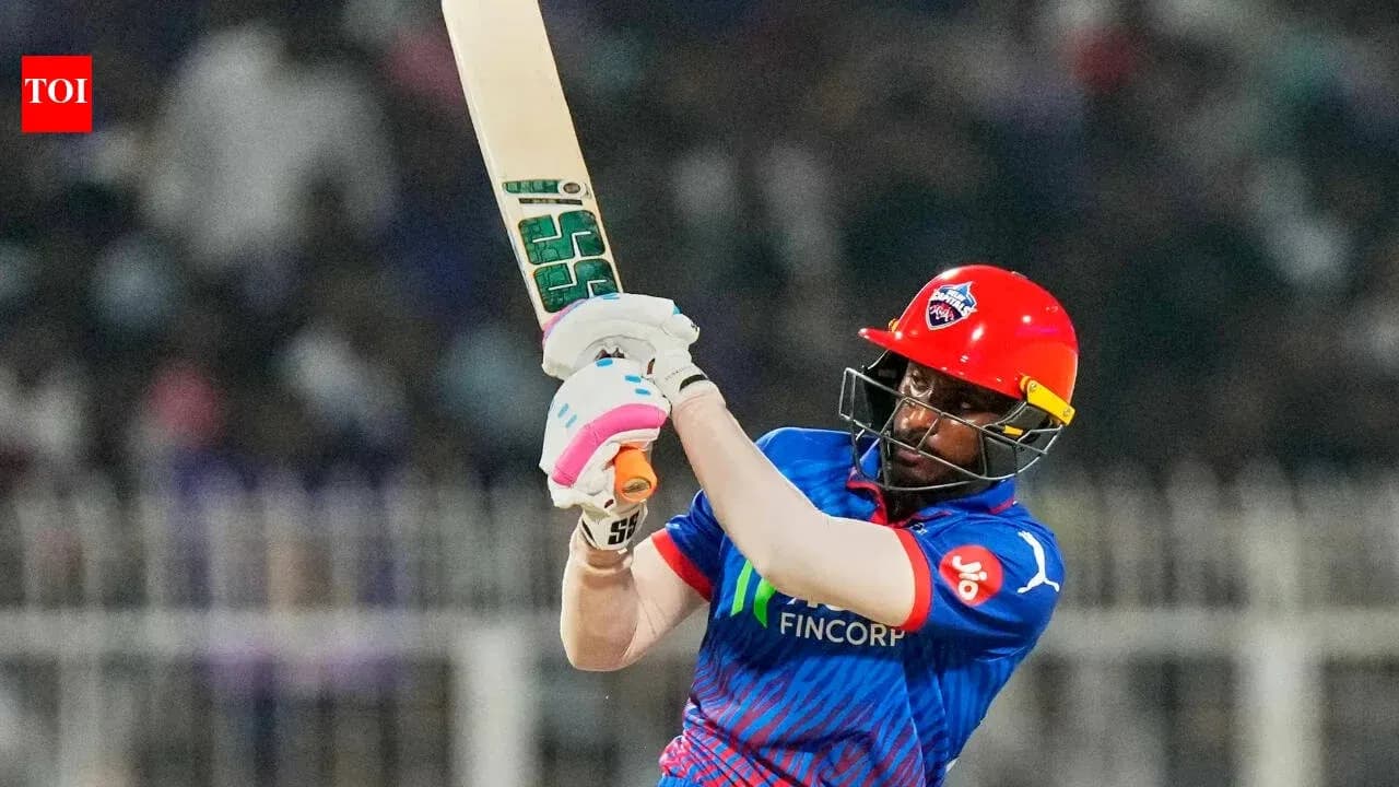 Batsman swinging bat during cricket match Batsman swinging bat during cricket match
